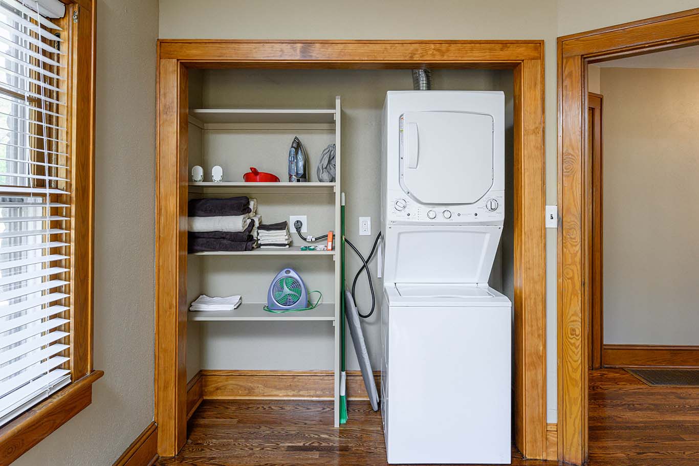 Convenient stackable washer dryer combo fits well into a laundry closet