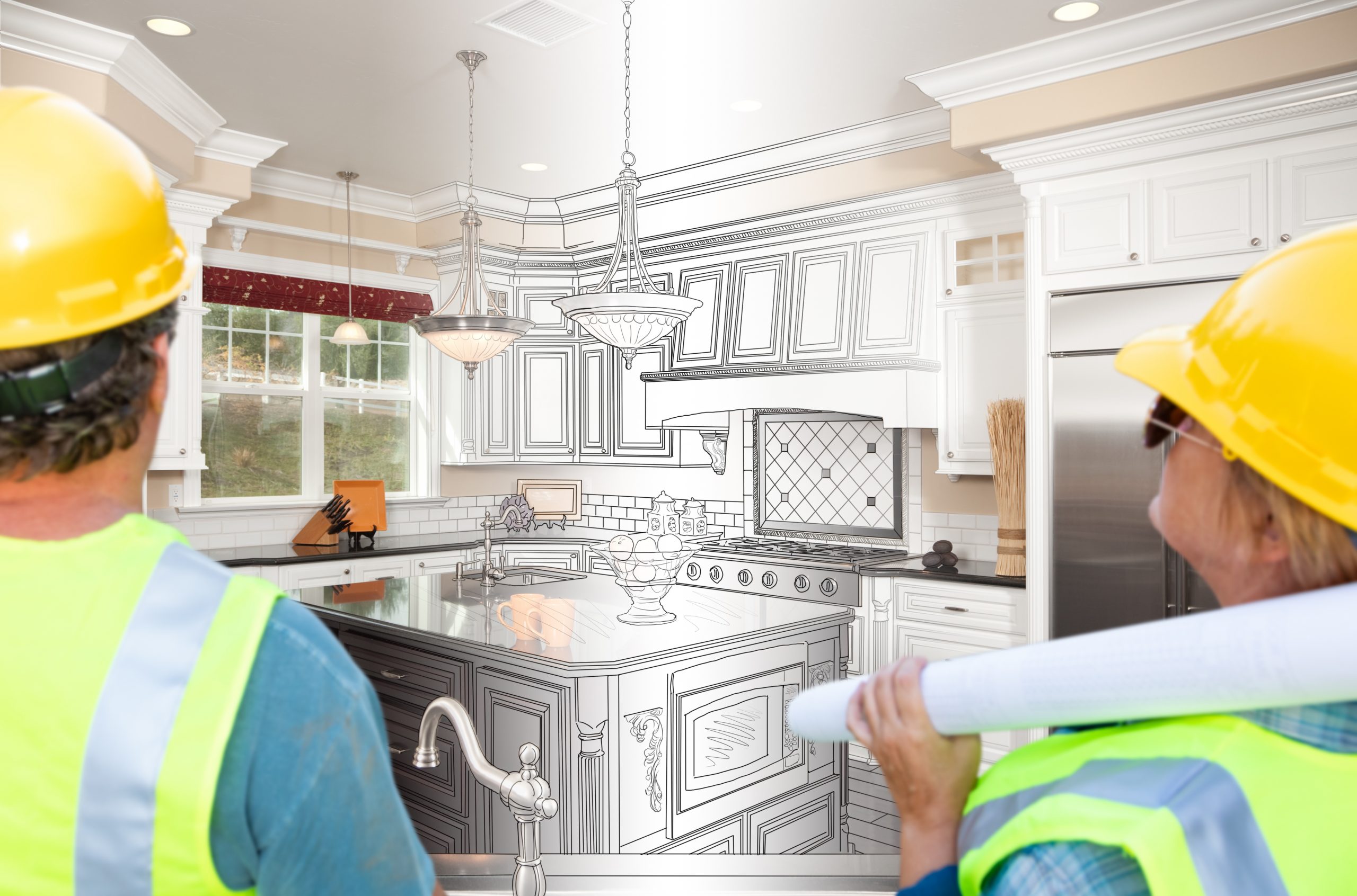 Male and Female Contractors Overlooking Kitchen Drawing Transition to Completed Project.
