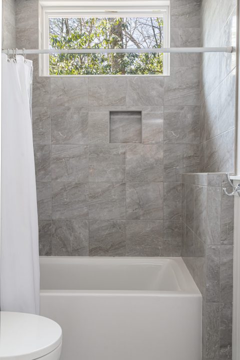 Profile view of tiled shower in Whispering Pines, North Carolina.