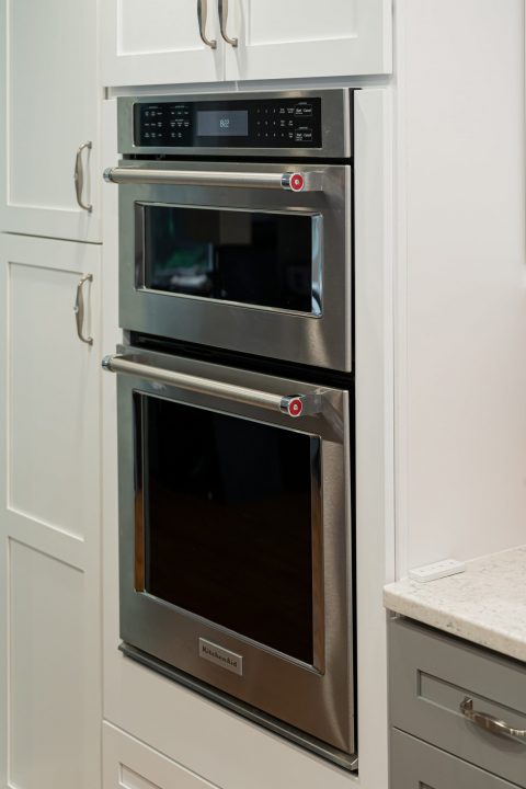 Close up detail of cabinetry and double oven in Black Mountain, North Carolina.