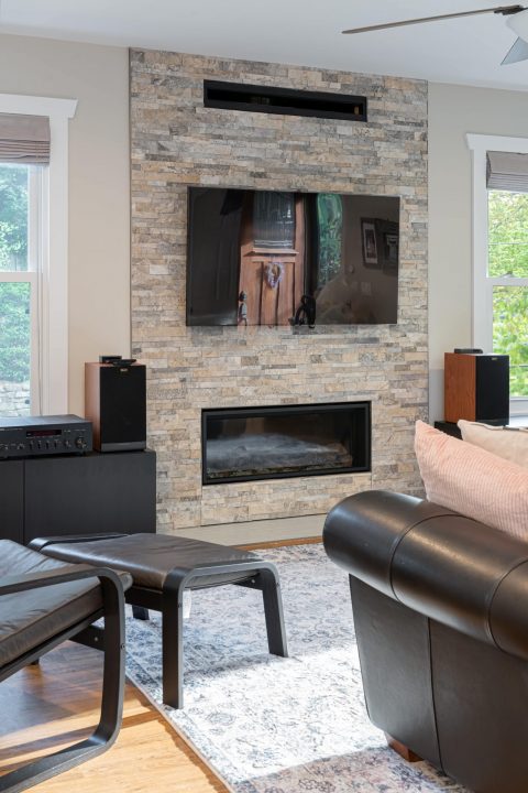 Living room showcasing a stone fireplace in Black Mountain, North Carolina.