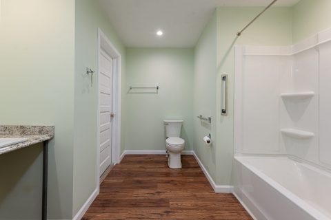 Sideview of bathroom showcasing toilet and shower in Montreat, North Carolina.