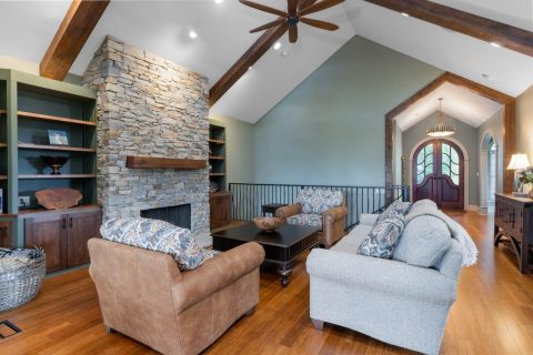 Living Room with stone fireplace in Black Mountain, North Carolina.
