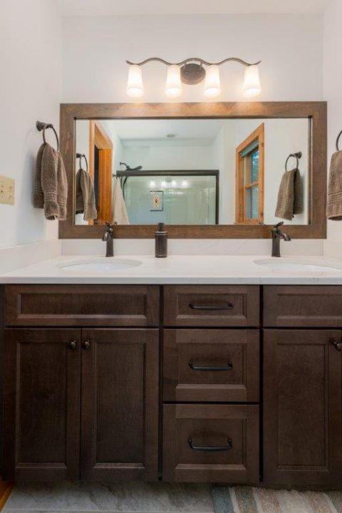 Vanity and large accent mirror in Old Fort, North Carolina.