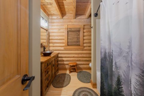 Sideview of log cabin bathroom in Black Mountain, North Carolina.