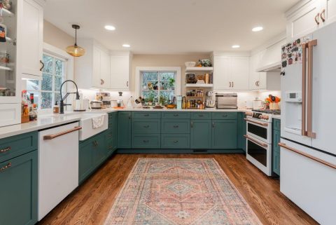 Main view of kitchen showcasing brushed copper finishes on appliances in Black Mountain, NC.