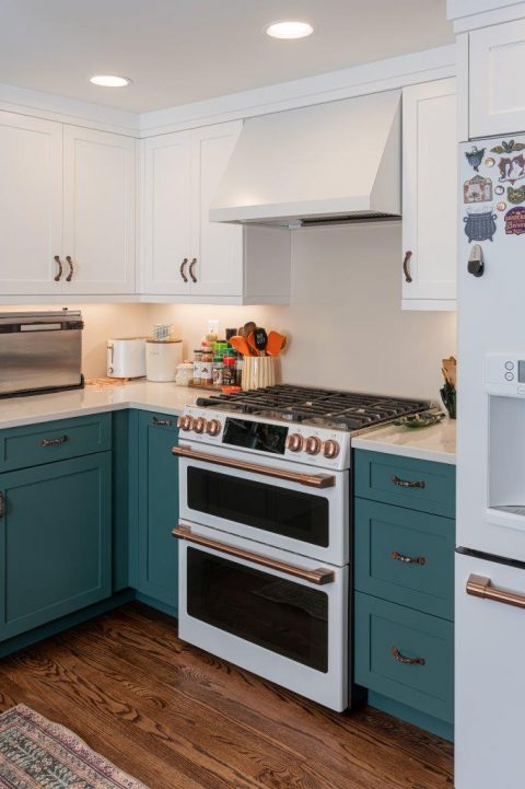 Two toned cabinetry with double oven in Black Mountain, North Carolina kitchen.