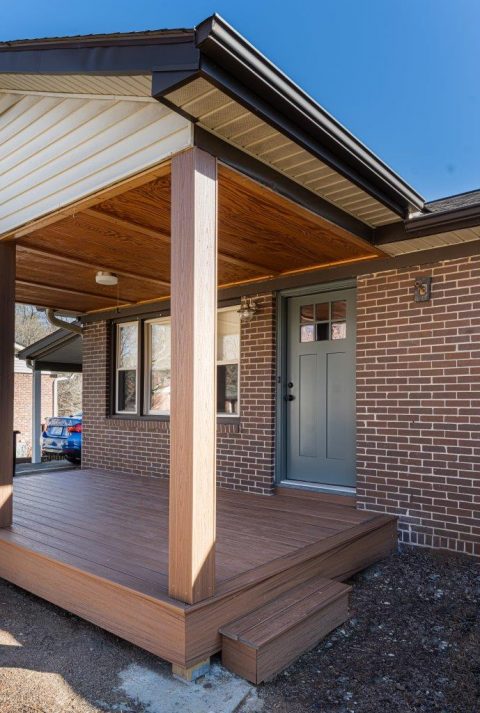 Detail view of front door on newly renovated front porch in Asheville, North Carolina.