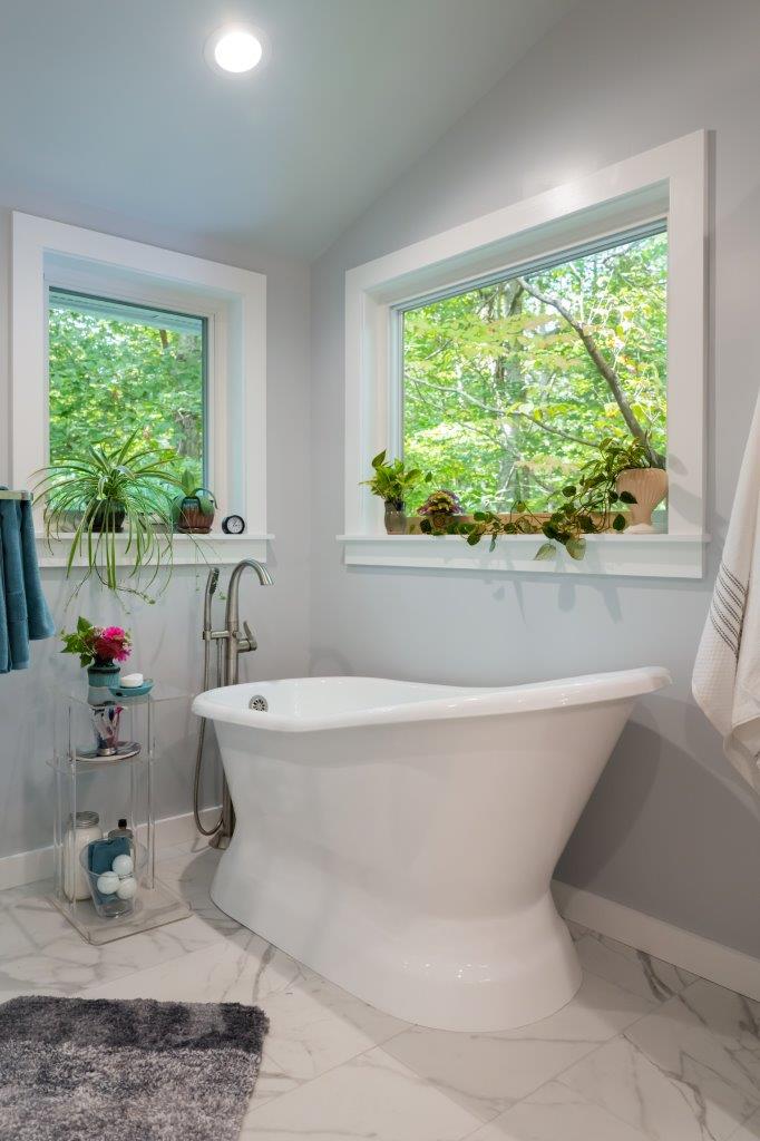 Soaker tub with window views in master bathroom addition