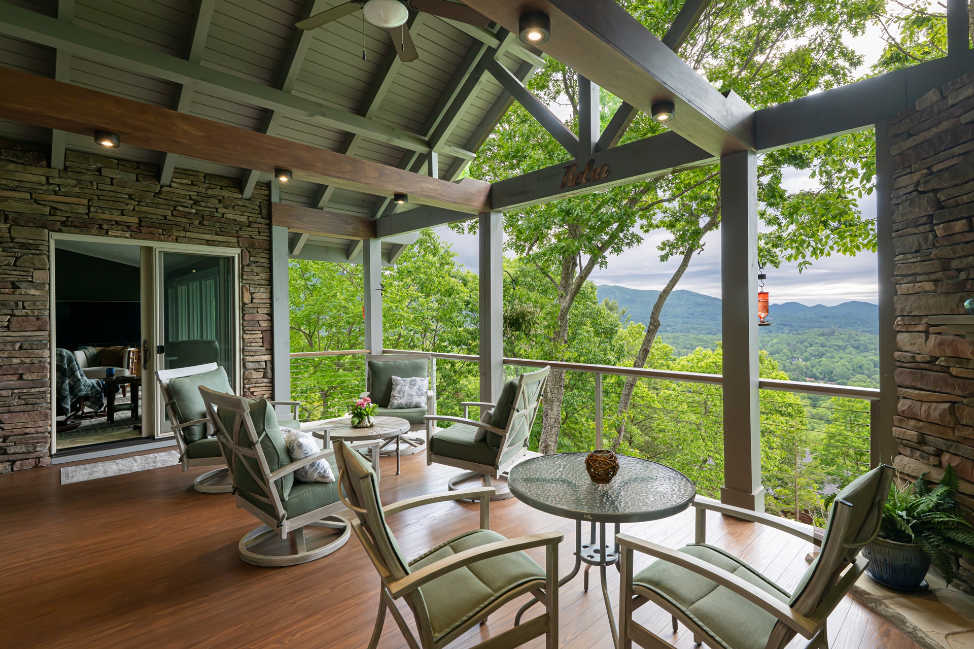 Outdoor living space and kitchen remodel in WNC with view of mountains.